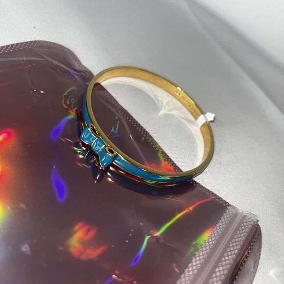 KATE SPADE NEW YORK Signed Teal Enamel Bow Bangle Bracelet. - Picture 1 of 5